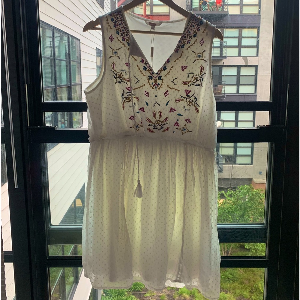 Sleeveless white summer dress